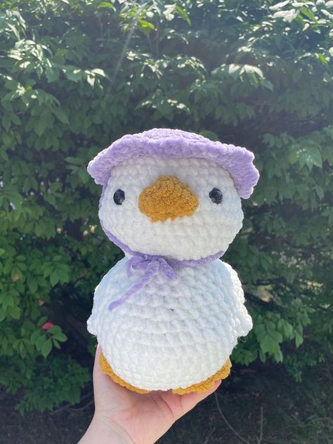 Mother goose , handmade crochet goose , goose crochet , goose amigurumi, goose with hat , tulip hat , purple hat , handmade crochet plush Crochet toys patterns free amigurumi #crochettoyspatternsfreeamigurumi #crochet #crochettoy #crochetpattern #crochetpatterns 1.383 Goose Amigurumi, Toys Quotes, Tulip Hat, Goose Crochet, Crochet Goose, Cute Goose, Cow Toys, Crochet Toys Free Patterns, Diy Crochet Patterns