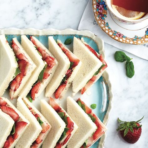 Strawberry tea sandwiches. Picnic-perfect. These summer tea sandwiches bring together sweet berries, fragrant herbs and creamy cheese in an unforgettable afternoon snack.  - Chatelaine Strawberry Tea Sandwiches, Strawberry Sandwiches, Brunch Toast, Clubhouse Sandwich, Appetizer Cups, High Tea Food, Tea Party Sandwiches, 31 Daily, Tea Sandwiches Recipes