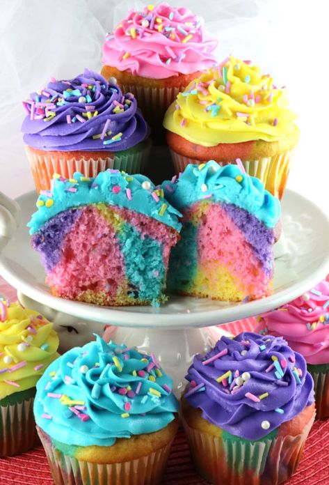 Celebration Marble Cupcakes - a beautiful and colorful cupcake that would be a great Easter dessert or wow at a Birthday Party, a Baby Shower or just a random Wednesday. Cupcakes never looked so good or were so easy to make. What a fun and delicious Easter Treat. Pin these beautiful Easter Cupcakes for later and follow us for more fun Easter Food Ideas. #EasterDesserts #EasterCupcakes #MarbleCupcakes #EasterTreats #Cupcakes Marble Cupcakes, Easter Fun Food, Unicorn Party Food, Easter Sweets, Cake Mini, Colorful Cupcakes, Cupcakes Decorados, Rainbow Cupcakes, Easter Cupcakes