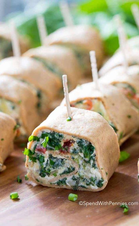 Looking for a quick and easy appetizer or snack? Spinach artichoke pinwheels are simple to prepare, ready in under 15 minutes, and filled with a savory cream cheese filling for an appetizer guests will love. #spendwithpennies #spinachartichokepinwheels #pinwheels #appetizer #partyappetizer #easyappetizerrecipe #bestpinwheels #spinachartichoke #flatbread Spinach Artichoke Pinwheels, Artichoke Pinwheels, Bite Sized Appetizers, Bite Size Appetizers Easy, Weight Watchers Appetizers, Cold Appetizer, Caprese Salad Skewers, Yummy Appetizers Parties, Cucumber Appetizers