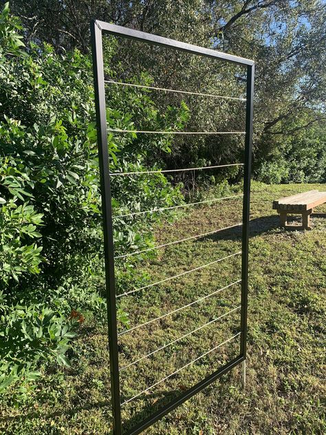 "This is a Modern, Simple, Clean Design, Sturdy Built, Stainless Steel Wire Garden Trellis with 1\" aluminum frame. This rectangular metal trellis is the perfect gift for the avid gardener! Wouldn't you love to have your gorgeous vines or Bougainvillea climbing up this lovely Trellis? Other colors on request. 60\" x 33\" Wide or 60\" Tall x 22\" wide, Dimensions not including stakes Stake options are 8\" and 12\" OR Wall Mounts are available SEE OPTIONS WHEN CHECKING OUT Check our shop for other Wall Mounted Trellis, Metal Garden Trellis, Wire Trellis, Metal Trellis, Trellis Plants, Climbing Vines, Plant Stands, Sarasota Fl, Classic Metal