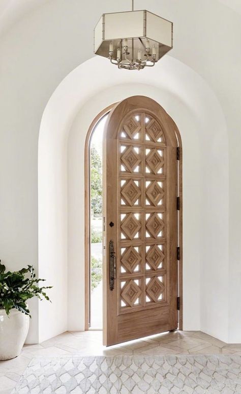 Rounded Interior Doors, House With Arched Front Door, Wood Arch Door, Arched Doorway Exterior, Arch Front Door Exterior, Spanish Front Door, Neutral Entryway, Arched Exterior Doors, Beige Entryway