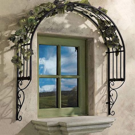 PRICES MAY VARY. Decorate Your Door: Grow flowers and foliage to your windows that you can see at eye level! This solid curved decorative trellis provides an archway for climbing vines, perfectly decorating your door, balcony, and window. Wrought Iron Grid: Showcasing solid iron scroll work, the trellis offer functional vine support, ideal for climbing plants such as rose, mandevilla, ivy, honeysuckle, clematis and jasmine. Rust Free Surface for All weathers: Paint powder is sprayed electrostati Garden Trellis Arch, Window Trellis, Trellis Patio, Wall Mounted Trellis, Trellis Arch, Window Trellises, Patio Trellis, Decorative Trellis, Garden Arch Trellis