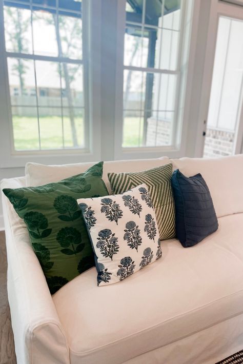 Blue Green Black White Living Room, White Couch Green Pillows, Blue And Green Pillows On Couch, Blue And Green Throw Pillows, Green Plaid Pillows, Original Farmhouse, White Leather Sofas, Navy Pillows, Farmhouse Style Living Room