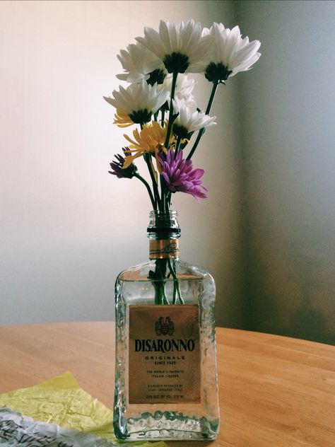 Reuse Alcohol Bottles, What To Do With Old Alcohol Bottles, Alcohol Bottle Flower Vase, Flowers In A Wine Bottle, Flowers In Alcohol Bottles, Alcohol Bottle Vase, Alcohol Bottle Crafts Diy Ideas, Alcohol Bottles Decoration Ideas, Diy Alcohol Bottles Crafts