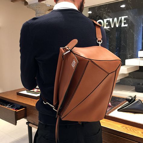 I Can Wear it How?! Loewe Puzzle Bag Outfit, Loewe Puzzle Bag, The Sartorialist, Loewe Puzzle, Puzzle Bag, Brown Leather Backpack, Bag Obsession, Loewe Bag, Bag Boys