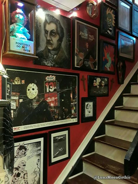 Our home is filled with horror themed room decor & collectables. Our home is 1500 square feet, so we use every inch to our advantage. We have filled the staircase wall with Horror Art from local Florida artists as well as art we have created ourselves. Horror Movie Collection Room, Halloween Themed Room Decor, Horror Movie Theater Room, Horror Home Aesthetic, Scary Movie Room Ideas, Horror Office Decor, Horror Themed Apartment, Movie Theme Room Decor, Horror Movie House Decor