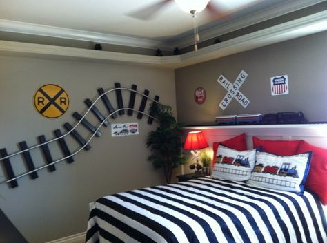 Trains! Train themed kids rooms that will makes any kids dreams come true! Featured on Designdazzle.com Transportation Bedroom, Train Bedroom, Railroad Crossing Signs, Theme Bedrooms, Transportation Vehicles, Railroad Crossing, Train Decor, Theme Bedroom, Train Room