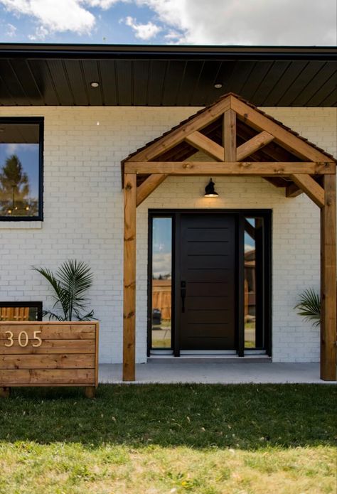 Black Front Door With Wood Beams, Adding Wood Beams To Front Porch, A Frame Front Door, Wood Awning Over Door Front Door, Front Door Awnings Entrance House, Front Door Roof Ideas Entrance, Timber Porch Ideas, Wood Awning Over Door, Front Door Roof