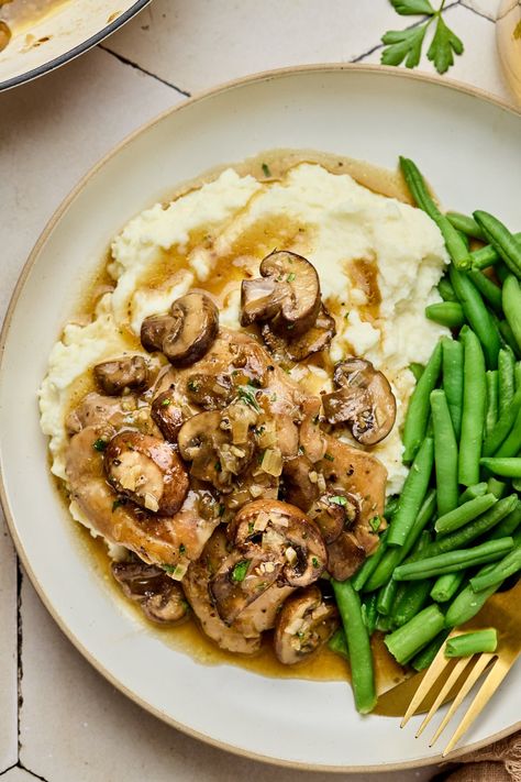 Introducing my delicious and easy chicken thighs smothered in a buttery white wine mushroom sauce. A easy and cozy weeknight meal or a dazzling dish to impress your guests! Chicken Thighs With Mushroom Gravy, Chicken Thighs With Mushrooms, Easy Chicken Thighs, Chicken In Wine Sauce, Mushroom Wine Sauce, Chicken Thighs Mushrooms, White Wine Chicken, Chicken And Mushroom, Smothered Chicken