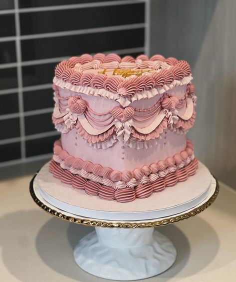 Look at her!!!! Isn’t she lovely?! Happy birthday Carmita Obsessed with this color scheme by @colour.mill (dusk) Cake drum • @cakebonofficial Food gel • @colour.mill Piping tips • @wiltoncakes Smoother • @sweet_escape001 Everything else! • @heb . . . . . . #cake #sanantonio #sanantoniosmallbusiness #sanantoniocakes #sanantonioeats #sanantonioevents #sanantoniofood #sanantoniofoodie #sanantoniobaker #bakedsa #bakery #foodie #food #cakeoftheday #cakeofinstagram #cakeoftheweek #cakebon... Classic Pink Birthday Cake, Pink Tiered Cake, Pink Birthday Cake Macaron, Two Tier Vintage Cake Pink, Purple And Pink Vintage Cake, San Antonio Food, Vintage Birthday Cakes, Piping Tips, Vintage Cake