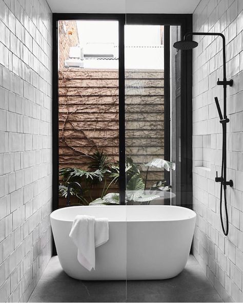 Got a small space to work with? Here are our top tips for maximising your bathroom space: • Include mirror cabinets to add extra storage to a small space • Placing the shower in front of the bath gives you a full walk-in shower in a small footprint • Opting for a wall hung vanity means more visible floor and results in the room appearing larger 🙌🏻 • Opt for light or white tiles • Utilise large mirrors Follow us on Instagram and Pinterest for more design tips and inspo. Shower Bath Combo, Bathroom Freestanding, Minimal Interior Design, White Wall Tiles, Bad Inspiration, Interior Minimalista, Melbourne House, Tub And Shower, 아파트 인테리어