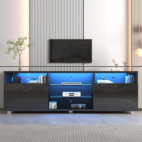 New 🎉 St.Mandyu LED TV Stand for 50/55/60 inch TV, Modern Television Table Center Media Console with Drawer and Led Lights, High Glossy Entertainment Center for Living Game Room Bedroom, Black¡ 【High Quality LED TV Stand】High-hardness durable particleboard + tempered glass, using a smooth paint process, while ensuring firmness and permeability, it is very beautiful and practical. 【 Adjustable LED Remote System】Equipped with remote control, features 20 colors of RGB LED lights and 8 flash effe... Television Table, 80 Inch Tv, Game Room Bedroom, Living Room Cleaning, Led Tv Stand, Audio Room, Tempered Glass Shelves, Bedroom Black, Tv Stands And Entertainment Centers