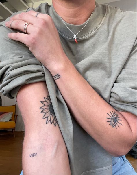 Arm tattoos, eye, sunflower, beach, vida, finger tattoos Symmetrical Arm Tattoos, Behind The Arm Tattoo, Tattoo Placement Arm, Medium Size Tattoos, Small Tattoo Placement, Arm Tats, Good Luck Spells, Flabby Arms, Luck Spells