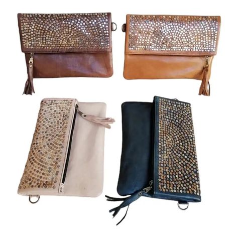 The Stylish Moroccan Leather Clutch Bag, handcrafted from premium cowhides with eco-friendly dyes. Versatile, elegant, & sustainable, perfect for any occasion.... https://giftsmorocco.com/product/moroccan-leather-clutch-bag-handmade-sustainable-luxury/ Moroccan Bags, Moroccan Leather, Leather Clutch Bags, Colorful Gifts, Leather Tassel, Soft Suede, Leather Clutch, Bag Tags, Crossbody Bag