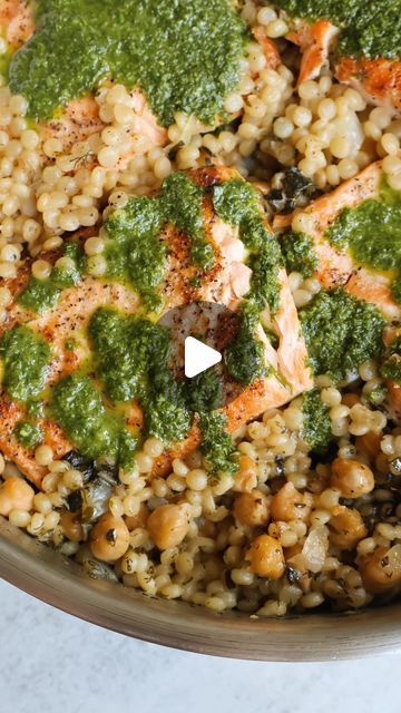 Gal Shua-Haim MS, RD on Instagram: "herbed pearl couscous & salmon 🌿  this one-pan meal is full of bold, fresh flavors! made with pan-seared salmon that’s cooked in a herby couscous and chickpea base then topped with a zesty herb sauce  comment “herb salmon” to get the full recipe sent directly to you, or google “something nutritious herb couscous and salmon”   https://somethingnutritiousblog.com/herbed-pearl-couscous-and-salmon/" Salmon And Couscous Recipes, Couscous And Salmon, Couscous Salmon, Herby Couscous, Herb Couscous, Salmon Couscous, Pearl Couscous Salad, Herb Salmon, Salmon Recipes Pan Seared