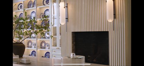 Fluted fireplace texture using plaster Fluted Fireplace Surround, Dakota Johnson Kitchen, Kris Jenner Kitchen, Fluted Fireplace, Moore Kitchen, Hotel Penthouse, Celebrity Kitchens, Luxurious Family, Roman And Williams