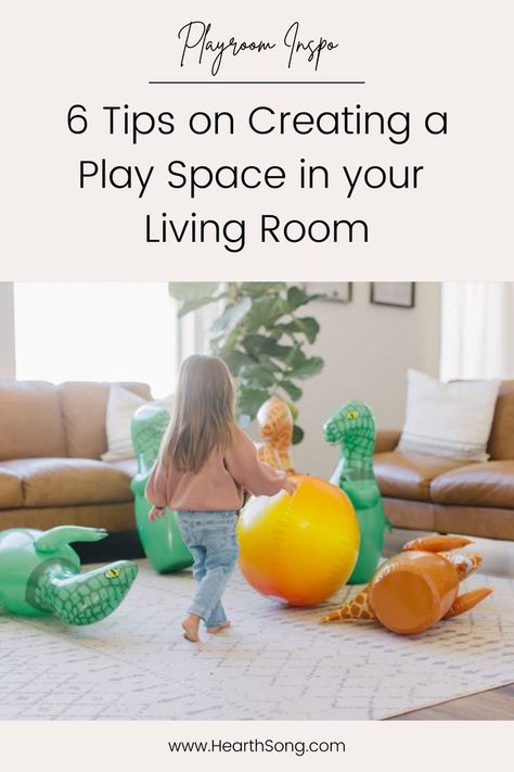 6 Tips on Creating a Play Space in your Living Room - Photo of a child playing with inflatable dinosaur bowling in a living room. Living Room With Toddler Play Area, Infant Play Area In Living Room, Baby Play Area In Living Room, Small Play Area In Living Room, Play Corner In Living Room, Infant Play Area, Play Area In Living Room, Toddler Play Area, Baby Play Areas