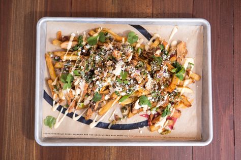 With football season in high-gear, passionate fans need something to snack on during living room celebrations. Enter The Crack Shack’s Mexican Poutine. Developed by Top Chef: All Stars winner chef Richard Blais, the dish is a twist on the traditional poutine, making each fry a satisfying grab.The Mexican Poutine begins with fries fried in schmaltz, which brings an [...] Mexican Poutine, Football Snacks, Game Day Appetizers, Seafood Appetizers, Game Day Snacks, Poutine, Top Chef, Football Season, Tasty Dishes