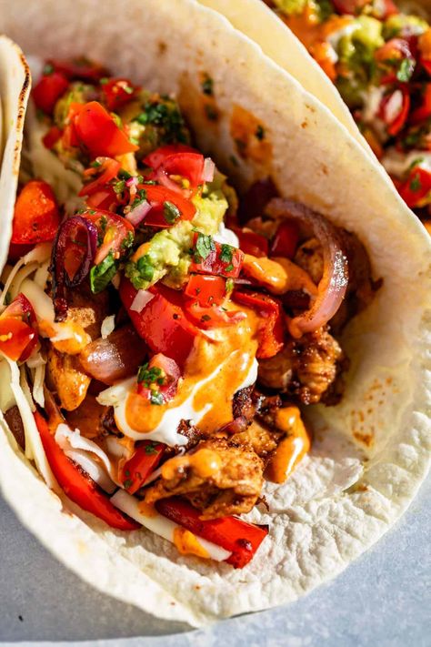 These Blackstone Fajitas are easy to make with the griddle, creating that perfect 'seared' fajita flavor. Classic chicken fajita flavors are made even easier with less mess on a Blackstone griddle outside! This recipe is gluten-free with dairy-free options and the perfect family dinner or weekend entertaining recipe for outdoor cooking. If you don't have a Blackstone, you can follow the stovetop skillet instructions instead. Healthy Blackstone Griddle Recipes Dinners Healthy, Blackstone Fajitas Chicken, Blackstone Chicken Fajitas, Blackstone Fajitas, Chicken Fajitas Skillet, Homemade Fajita Seasoning, Chicken Fajita Recipe, Gluten Free Tortillas, Pan Chicken Fajitas