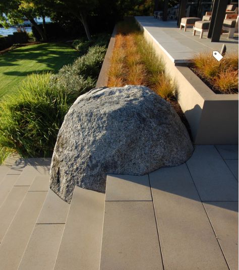 large boulders like this at the corner(s) of the actual house?  : ) Naturalistic Planting, Poured Concrete Patio, Modern Patio Design, Paver Designs, Modern Lake House, Landscaping With Boulders, Areas Verdes, Sloped Garden, Patio Wall