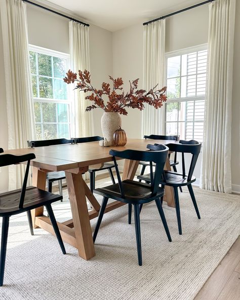 Sharing some still shots of our dining room with subtle fall touches. Still swooning over this gorgeous rug. Love the pattern, texture and neutral tones that helped to define this space. 🤎 Comment SHOP below to receive a DM with the link to shop this post on my LTK ⬇ https://liketk.it/4T7C2 #diningroom #diningroomtable #diningroomdecor #diningroomchairs #falldecor #autumndecor #fallflorals #loloirugs #amberinteriors Neutral Dining Room Ideas, Dining Room Set Up, Monochromatic Dining Room, Modern Organic Dining Room, Organic Dining Room, Simple Dining Room, Neutral Dining Room, Fall Dining Room, Natural Wood Table