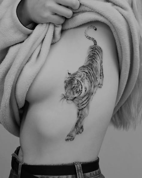 Thigh Piece Tattoos, Rib Tattoos For Women, Leopard Tattoos, Tiger Tattoo Design, Discreet Tattoos, Dainty Tattoos, Feather Tattoos, Tiger Tattoo, Rib Tattoo