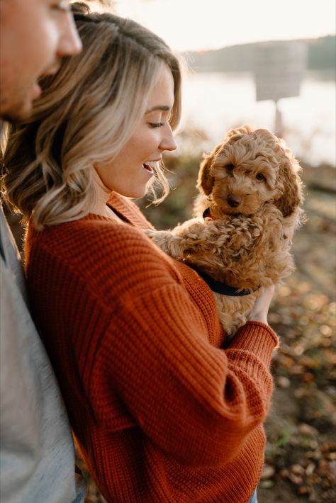 Fall session at Lake Brandt with new golden doodle puppy | by Kayli LaFon Photography, North Carolina Wedding & Elopement Photographer | Couple photos with dog New Dog Photoshoot, Puppy Photography Photo Shoots, Puppy Couple Photoshoot, Couple Pictures With Puppy, Fall Couple Photos With Dog, Fall Couples Photoshoot With Dog, Cute Dog Poses, Couple With Dogs Photoshoot, Couple Poses With Dog