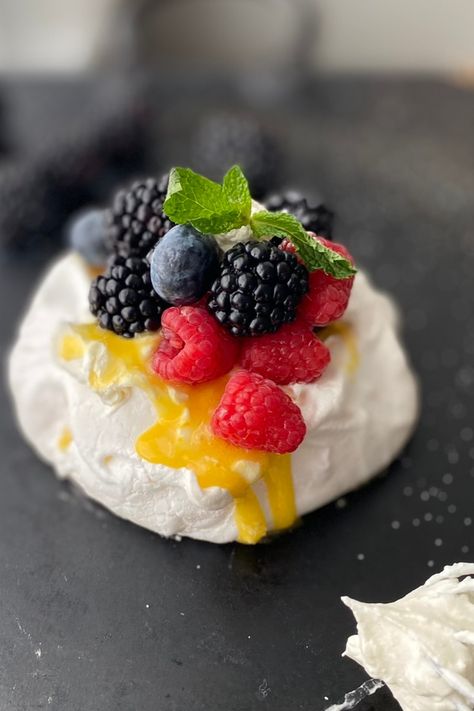 Gluten-Free Pavlova is a crisp, sweet meringue shell with lemon curd and whipped cream topped with fresh berries. Pavlova With Lemon Curd, Chocolate Pavlova, Mini Pavlova, Lemon Curd Recipe, Birthday Lunch, Beautiful Desserts, Fresh Berries, Lemon Curd, Egg Whites