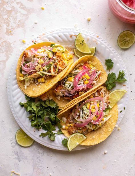 Grilled Fish Tacos with Jalapeño Corn Slaw Corn Slaw, Jalapeño Corn, Battered Fish Tacos, Beer Battered Fish Tacos, Grilled Romaine Salad, Grilled Fish Tacos, Quick Pickled Onions, Salmon Tacos, Lent Recipes