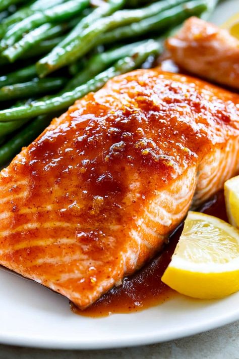 Looking for a delicious and healthy dinner idea? Try this irresistible Brown Sugar Baked Salmon recipe that's perfect for any night of the week. This dish combines the sweetness of brown sugar with the savory goodness of baked salmon. It's simple to make, yet full of flavor, making it a great choice for busy weeknights or special occasions. Serve this mouthwatering dish with your favorite side dishes and enjoy a meal that will impress your family and friends. Bake Salmon In Oven Recipes, Brown Sugar Salmon Baked, Recipe For Baked Salmon, Salmon Rub Recipe Brown Sugar, Salmon Recipes Baked Brown Sugar, Salmon Glaze Recipes Brown Sugar, Baked Salmon Fillets Oven, Brown Sugar Salmon Recipes, Salmon Recipes Baked Oven