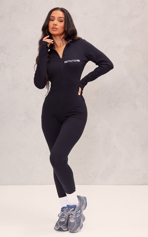 Your chilled days are in need of this PrettyLittleThing petite black embroidered zip front catsuit. This catsuit is made from a black material with a 'PrettyLittleThing' embroidered design and a zip front, how could you say no Whether you're spending the day relaxing at home or running errands, this catsuit needs to be your go-to. Style it with box-fresh kicks and accessories for the perfect off-duty fit.   Length approx 123cm/48 (Based on a sample size UK 6)   Model wears size UK 6/ EU 34/ AUS Plt Catsuit, Cat Suit Outfit, Christmas List Clothes, Full Bodysuit Outfit, Black Romper Outfit, Petite Romper, Catsuit Outfit, Uni Fits, Full Bodysuit