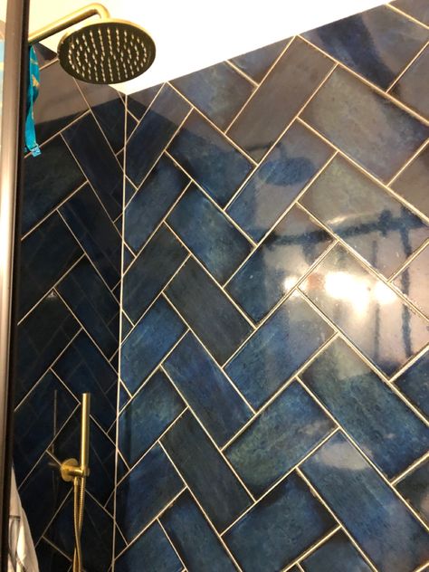 Blue Tile With Gold Grout, Blue Tile Gold Grout, Dark Blue And White Bathroom Ideas, Navy And Gold Master Bath, Deep Blue Bathroom Ideas, Shower Tile Black Hardware, Blue Brass Bathroom, Navy Blue And Gold Bathroom Ideas, Navy And Gold Bathroom Ideas