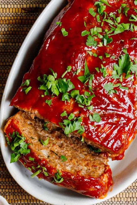 This keto meatloaf is moist, extra juicy, and topped with a sweet and tangy glaze! Made with simple ingredients, it's a low carb dinner recipe you'll make over and over again! 3 grams net carbs per serving. Glazed Meatloaf, Keto Meatloaf, Meatloaf Glaze, Low Carb Meatloaf, How To Cook Meatloaf, Meatloaf Ingredients, Good Meatloaf Recipe, Classic Meatloaf, Best Meatloaf