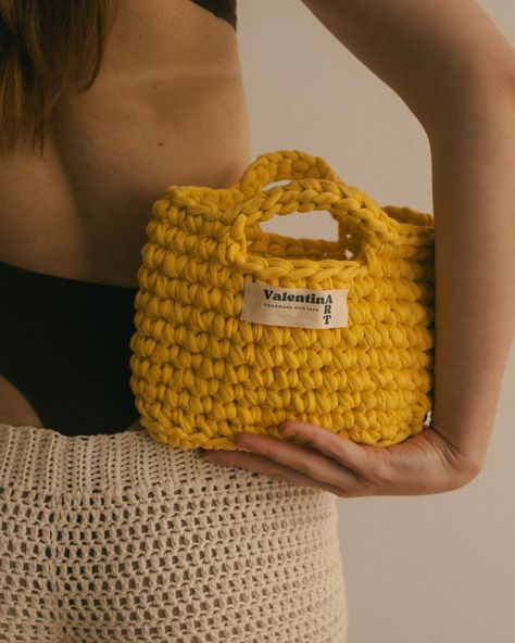 the TWINNY MINI in yellow 🌼 the perfect summer handbag made out of recycled textile yarn 📸 by @clagracian 👸🏽 @shelermann THANK YOU! #crochetbag #crochetbags #chunkycrochetbag #crochetbaginspo #crochetinspo #crochetinspiration #crochetfashion #fashionbag #ootd #bagoftheday #crochet #trendy #summervibes #petitbagseason #petitbag #fashion #sustainablefashion #birthdaypresent #giftidea #diy #crochetshoulderbag #crochetshopperbag #crochetbagpattern #bagpattern #bag #bags Yellow Crochet Bag, Crochet Trendy, Summer Handbag, Mini Hand Bag, Crochet Shoulder Bags, Yellow Crochet, Diy Pom Pom, Crochet Shoulder Bag, Summer Handbags