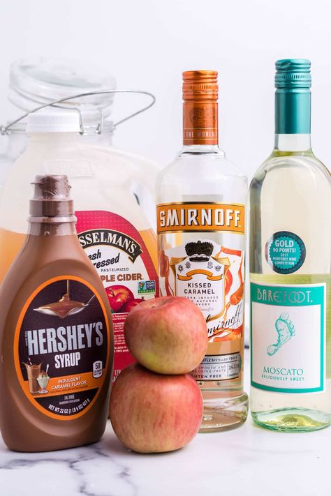 caramel apple sangria ingredients Apple Cider Whipped Vodka, Caramel Apple Sangria 4 Ingredients, Caramel Vodka Sangria, Carmel Apple Cider Sangria Recipe, Carmel Apple Sangria Moscato, Apple Pie Alcohol Drink, Apple Cinnamon Sangria, Carmel Apple Sangria Recipe, Carmel Apple Sangria Recipes