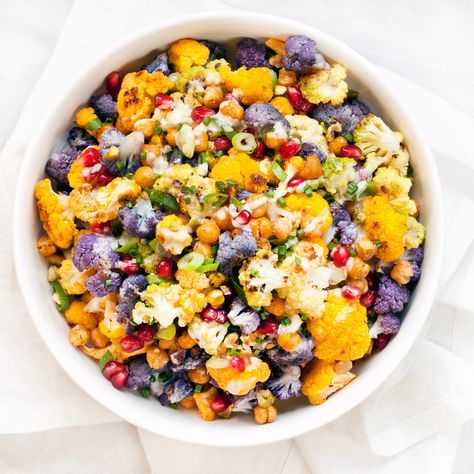 Roasted Rainbow Cauliflower Rainbow Cauliflower, Lemon Tahini Dressing, Crispy Chickpeas, Cauliflower Crust, Cauliflower Salad, Tahini Dressing, Eating Clean, Pomegranate Seeds, Cauliflower Recipes