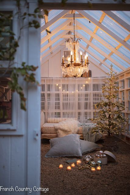 A merry little greenhouse Christmas tree -      All things merry and bright... even in the greenhouse. Green House In Winter, Mini Christmas Greenhouse, Christmas In The Greenhouse, Greenhouse In Winter, Christmas Greenhouse, Chandelier In Greenhouse, Greenhouse Chandelier, Greenhouse Decor, Greenhouse Fairy Lights