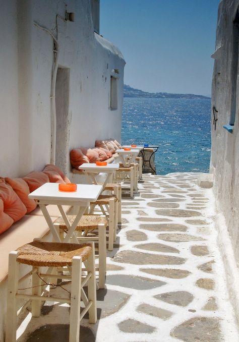 Alley cafe to the sea - Mykonos, Greece Grecia Santorini, Seaside Cafe, Mediterranean Architecture, Mykonos Greece, Future Travel, Mediterranean Sea, Paros, Greece Travel, Pretty Places