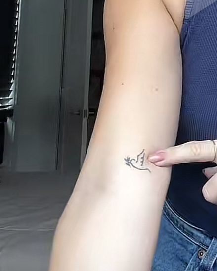 Dove And Bible Verse Tattoo, Dove Carrying Olive Branch Tattoo, Dove Olive Branch Tattoo, Dove And Olive Branch Tattoo, Upper Rib Tattoo Women, Dove Tattoo Design For Women, Dove With Olive Branch Tattoo, Simple Dove Tattoo, Agape Tattoo