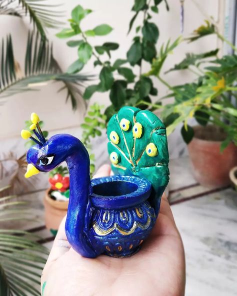 Made using Fevicryl mouldit on an old Diya. Diwali decor idea Fevicryl Mouldit Clay Art Ideas, Tea Pot Clay, Small Pot Painting Ideas, Fevicryl Mouldit Ideas, Mouldit Art Ideas, Math Exhibition, Matka Decoration, Dokra Art, Diya Diwali