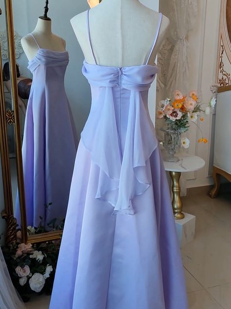 Step into a world of magic and elegance with this stunning Vintage Purple Satin Fairy Dress. The luxurious satin fabric in a dreamy purple hue drapes beautifully, exuding timeless charm and sophistication. The spaghetti straps add a touch of delicate femininity, making it perfect for any enchanting occasion. The highlight of this gown is the whimsical back wings design, adding a fairy-tale-like allure.   Garment Size   	 		 			Size 			XS 			S 			M 			L 			XL 			2XL 		 		 			Bust 			76 			80 			8 Strapless Lavender Dress, Simple Long Purple Dress, Pastel Purple Formal Dress, Pale Lilac Dress, Dress Bodice Styles, Periwinkle Dress Aesthetic, Vintage Formal Dresses 1950s, Draped Back Dress, Silk Ruffle Dress