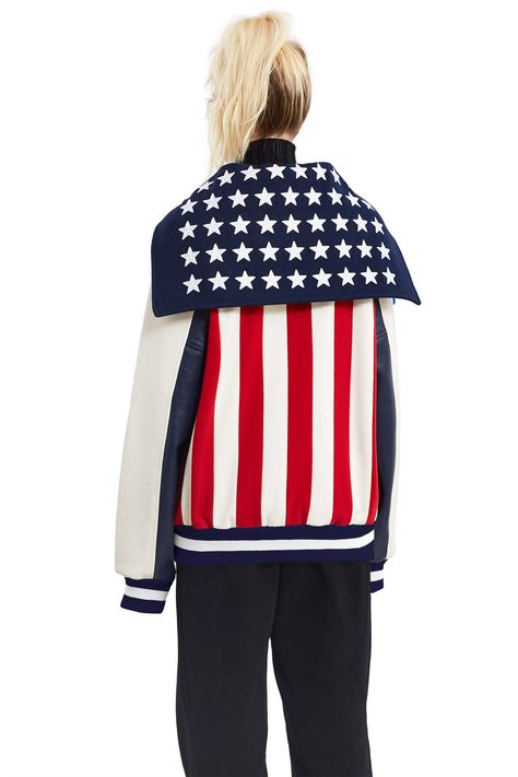 Opening Ceremony, USA Varsity Jacket The U.S.A. jacket sports all the iconic elements of the American flag—a star spangled sailor hood with the iconic red and white stripes down the back, which represent the former thirteen colonies., Unisex, Front snap button closures, Leather sleeves, Ribbed cuffs and hem, Leather trimmed side pockets, Body: 80% wool, 20% nylon; sleeves: 100% leather, Imported Thirteen Colonies, Leather Sleeves, Star Spangled, Streetwear Fashion Women, Fashion Designs, Leather Sleeve, Wedding Plans, Red And White Stripes, Opening Ceremony