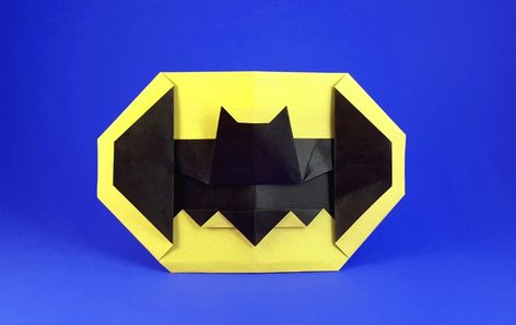 Origami Batman symbol by John Montroll Folded from a square of duo origami paper by Gilad Aharoni on giladorigami.com Batman Origami, Origami Logo, Origami Book, Bat Mask, Bat Symbol, Origami Diagrams, Ideas Navidad, Batman Symbol, Batman Birthday