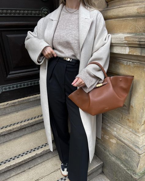 Her first outing 🥹💼🤎 outfit details below & linked on my @shop.ltk . Bag - @demellierlondon *pr Jumper & trousers - @arketofficial *pr Coat - old @hm Trainers - @adidas samba Belt - @amazonfashioneu Sunglasses - @ysl . . Transitional outfits, adidas sambas, black trousers, Demellier New York midi bag, minimal outfits . . #demellier #demellierlondon #adidassamba #adidassambaclassic #sambas #arket #arketofficial #blacktrousers #tanbag #brownbag #leatherbag #streetstyleluxe #streetstyleins... Demellier Bags Outfit, Demellier New York, Demellier London, Sambas Black, Transitional Outfits, Trainers Adidas, Outing Outfit, Adidas Sambas, Design Bags