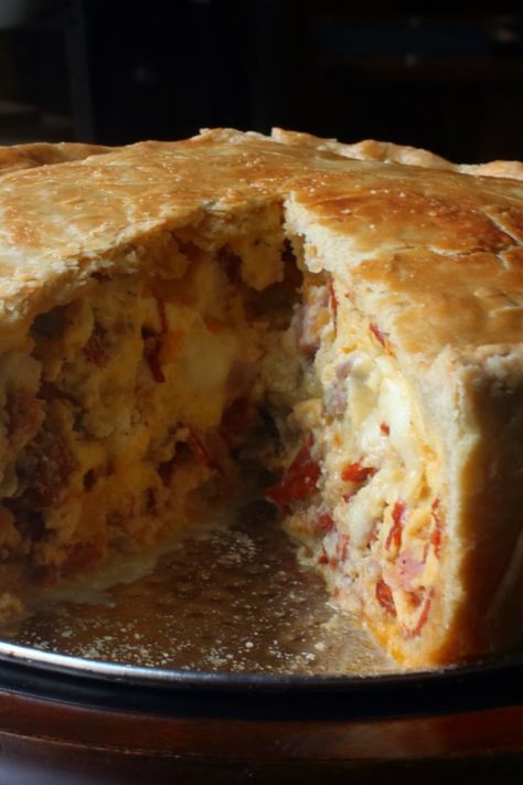 Chef John's Pizza Rustica | "Some people describe pizza rustica as an Italian meat-filled quiche, but I think this traditional Easter recipe is way closer to a savory cheesecake filled with a massive amount of goodness." #dinnerideas #dinnerrecipes #familydinnerideas #pizza #pizzarecipes #pizzaideas #homemadepizza Easy Pizza Rustica Recipe, Pizza Rustica Italian Recipe Giada, Pasta Rustica Recipe, Pizza Rustica Italian Easter, Pizza Rustica Italian Recipe, Pizzagaina Recipe, Frito Casserole, Easter Pizza, Italian Easter Pie