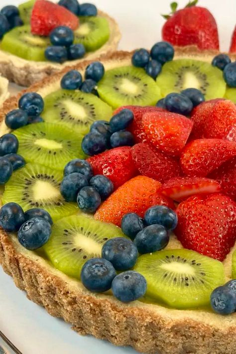 #GlutenFreeDesserts #KetoDesserts #VeganTart #SugarFreeBaking #DairyFreeRecipes #HealthyFruitTart #LowCarbTreats #HealthyDesserts #AllergyFriendly #GuiltFreeIndulgence #VeganFruitTart #FruitTart

Gluten-Free, Keto-Friendly, Vegan, Sugar-Free, Dairy-Free, Healthy Fruit Tart, Almond Flour Crust, Coconut Oil, Stevia Sweetener, Fresh Berries, Vegan Custard, Egg Substitute, Nut-Free Option, Homemade Treats, Low Carb Desserts Fruit Tart Gluten Free, Gf Fruit Tart, Fruit Tart Vegan, Dairy Free Fruit Tart, Gluten Free Mini Desserts, Healthy Fruit Tart, Keto Tarts, Healthy Fruit Tart Recipe, Mini Fruit Tart Recipe