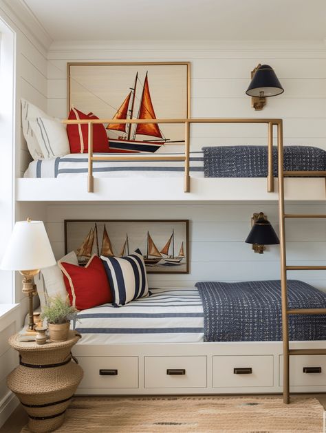 built in bunk beds with sailboat art and red and white and blue striped accent pillows Slanted Ceiling Bunk Room, Bunk Bed Beach Room, Nautical Room Ideas Interior Design, Kids Beach House Bedroom, Bunk Room Wallpaper, Navy Bunk Beds, Coastal Bunk Beds, Beach Bunk Beds, How To Style Bunk Beds