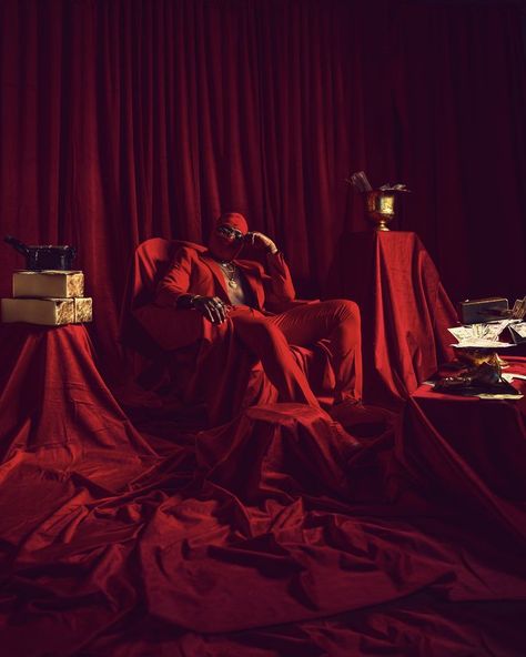 Red suit photoshoot Red Concept Photoshoot, Red Curtain Photoshoot, Red Back Drop Photoshoot Ideas, Photo Shoot Set Design, Red Suit Photoshoot, Red Couch Photoshoot, Color Backdrop Photoshoot, Drape Photoshoot, Red Magazine Cover