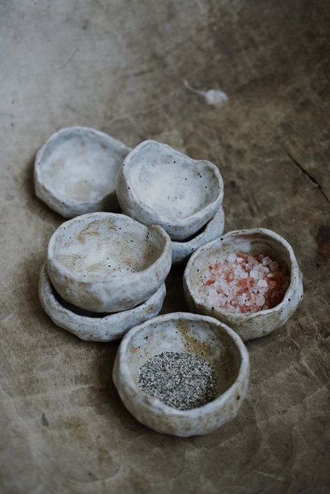 To add multiple pieces, please update the quantity at checkout.  These mini bowls are a perfect all rounder, from salt and pepper to a bedside jewellery pot. They can also a fit a small tea light inside to bring a warm glow to your table or mantelpiece. Finished in an off-white/oatmeal glaze with natural flecks from the clay showing through to the surface. Diameter measure approx 7, height approx 4cm Use the code HAPPYPOST for free UK delivery on orders over £150. Small Ceramic Bowl, Pinch Bowls, Rustic Pottery, Cerámica Ideas, Mini Bowls, Pinch Pots, Nesting Bowls, Ceramics Ideas Pottery, Ceramic Pot